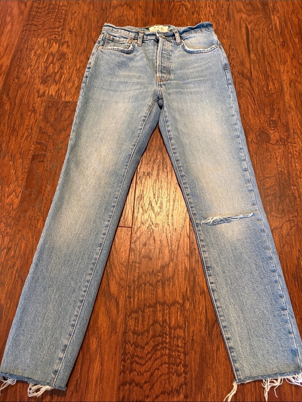 We The Free light wash jeans